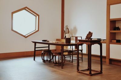 Chairs and tables on hardwood floor at home