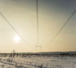 Scenic view of land against sky during sunset