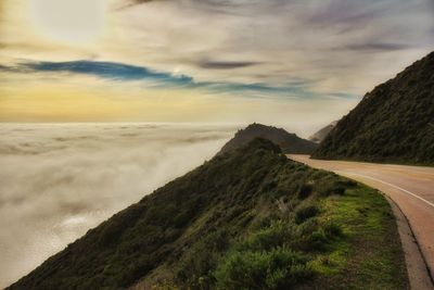 Scenic view of sea against cloudy sky