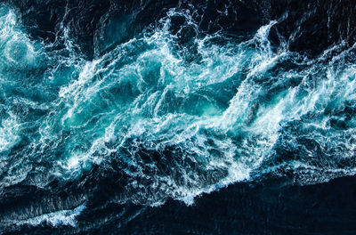 Sea waves splashing on rocks