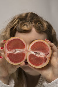 Close-up of woman holding ice cream