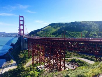 Low angle view of golden gate bridge against sky