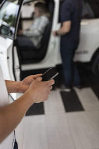 Customers in car dealership office