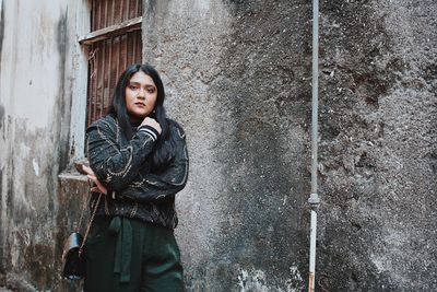 Portrait of a teenage girl in city