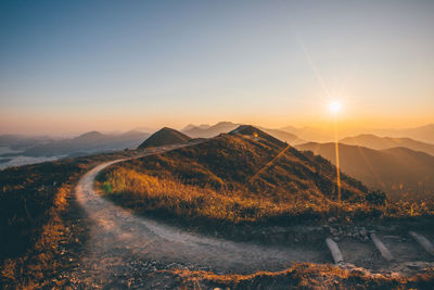 Scenic view of mountains against sky during sunset