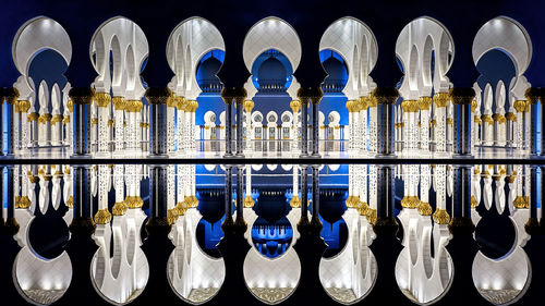 Panoramic shot of reflection of building in water