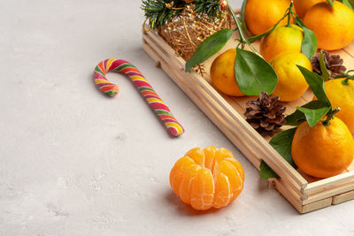 High angle view of orange fruits on table