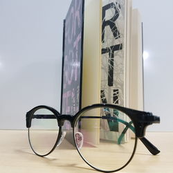 Close-up of eyeglasses on table