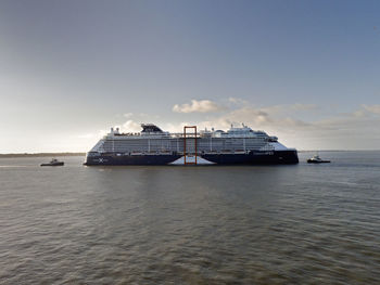 Nautical vessel on sea against sky