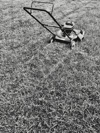 Boy sitting on field