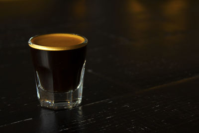 Close-up of beer in glass on table