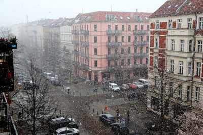 High angle view of buildings in city during winter