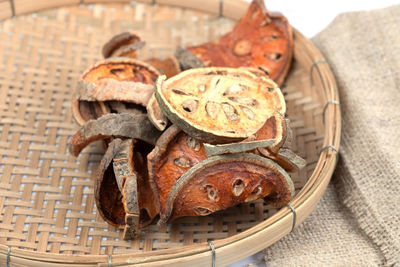 Close-up of chocolate cake in basket on table