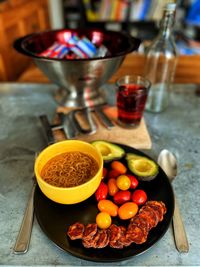 Close-up of fruits in bowl on table