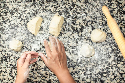 Low section of person preparing food