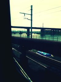 Train on railway station platform against sky