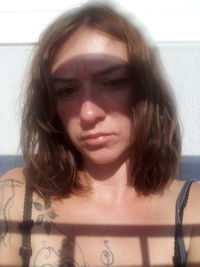 Close-up portrait of young woman