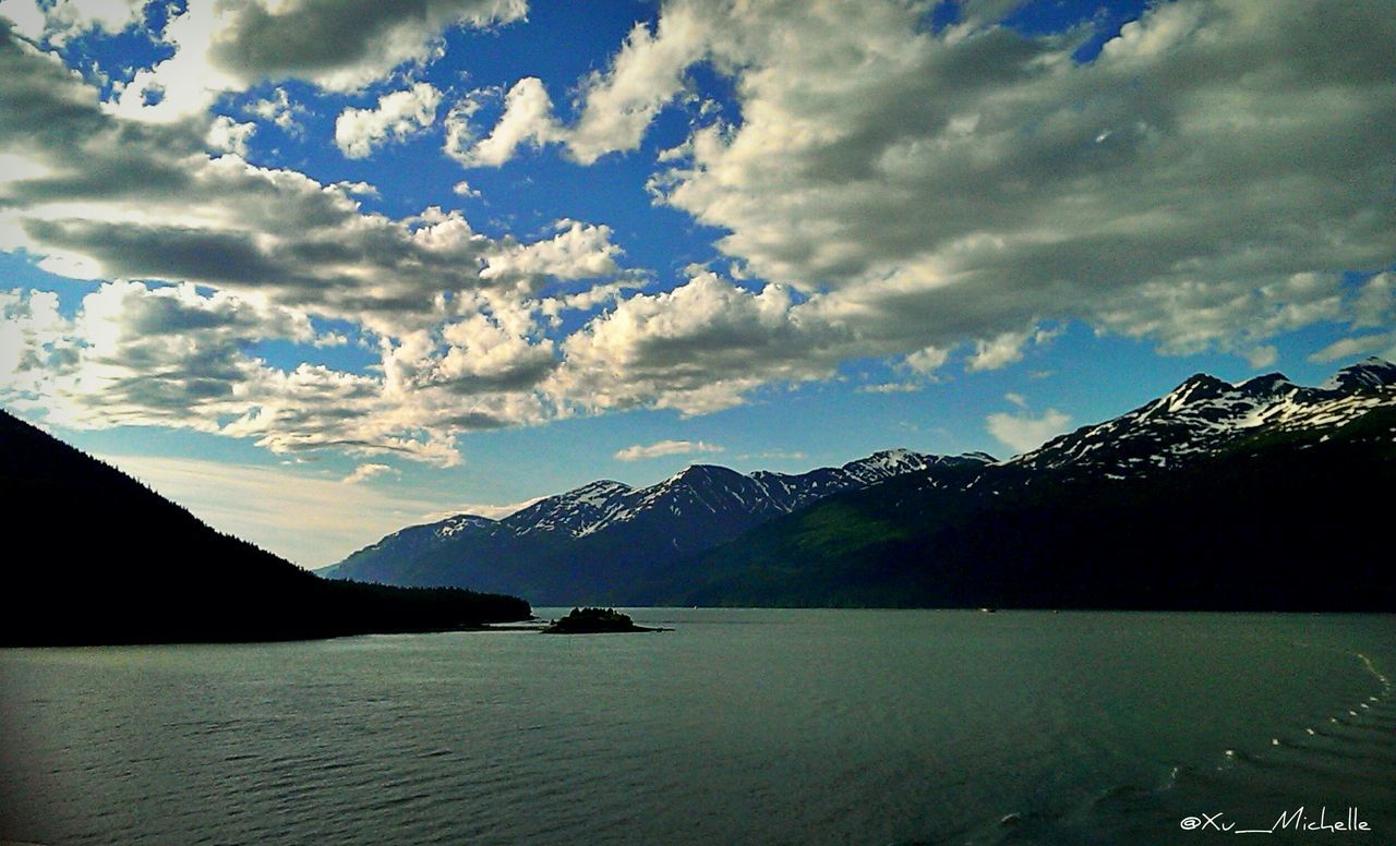 mountain, mountain range, tranquil scene, sky, scenics, tranquility, water, beauty in nature, cloud - sky, waterfront, lake, nature, cloud, cloudy, idyllic, landscape, non-urban scene, snowcapped mountain, outdoors, majestic