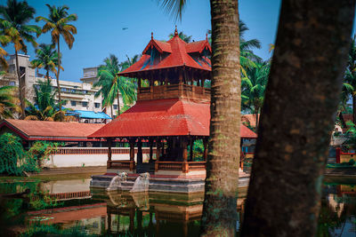 View of trees and buildings against sky in kochi, india