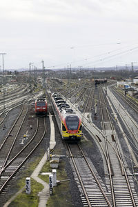 High angle view of train in city against sky