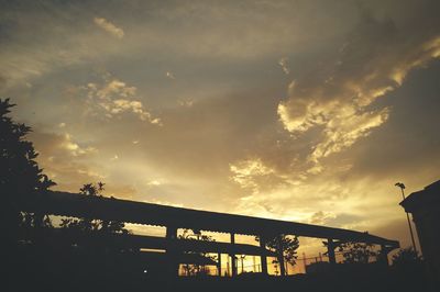 Low angle view of silhouette person against sky