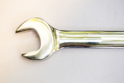 Close-up of fork over white background