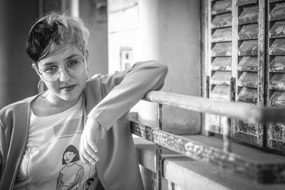 Portrait of young woman wearing sunglasses