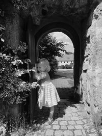 Girl standing in corridor