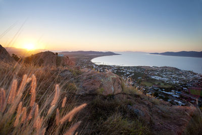 Sunset view of townsville, queensland, australia looking from castle hill towards the coast