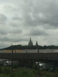 View of bridge against cloudy sky