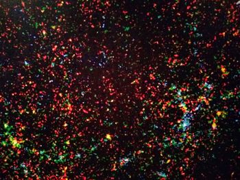 Full frame shot of multi colored painting against black background