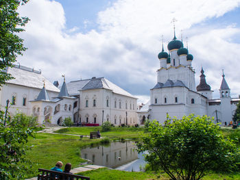 Exterior of church against cloudy sky