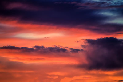 Low angle view of dramatic sky during sunset