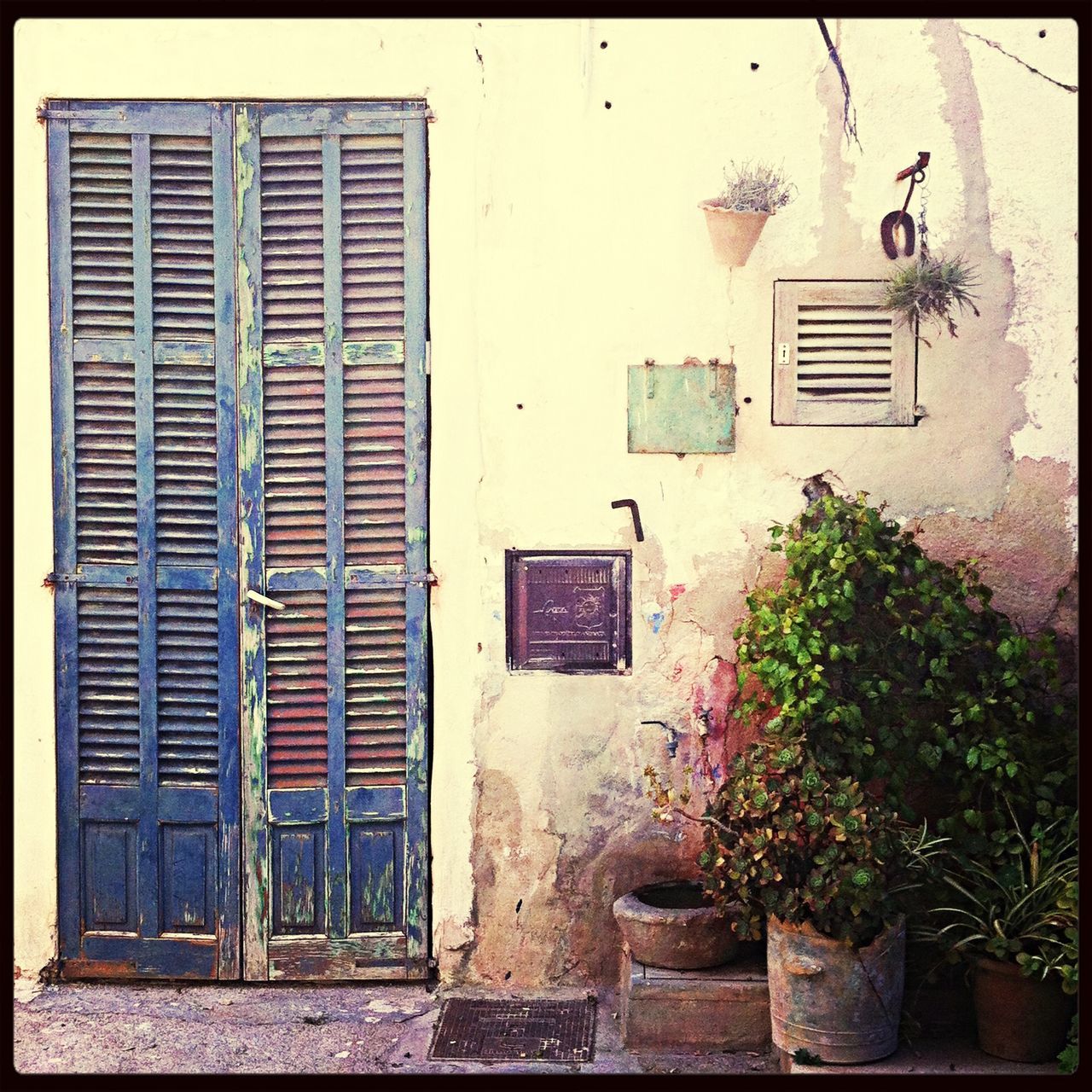 building exterior, architecture, built structure, window, door, house, residential structure, old, closed, weathered, wall - building feature, residential building, abandoned, transfer print, auto post production filter, wall, plant, building, damaged, outdoors