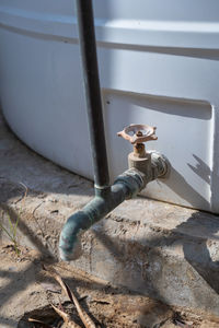 High angle view of faucet against wall