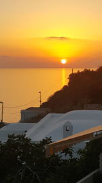 Scenic view of sea at sunset