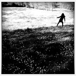 Reflection of woman in water