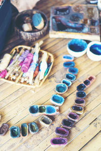 High angle view of multi colored decorations on table