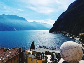 Panoramic view of sea and buildings against sky