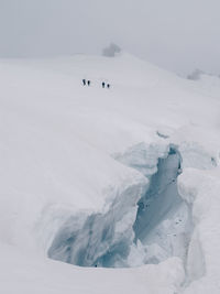 Scenic view of mountains during winter