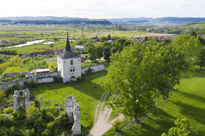 High angle view of trees and buildings against sky