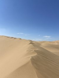 Scenic view of desert against sky