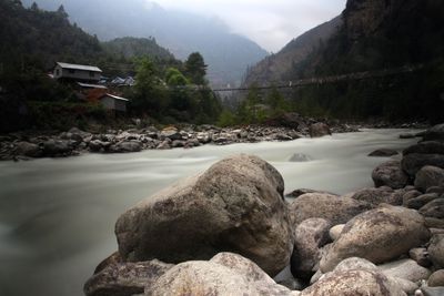 Scenic view of river and mountains