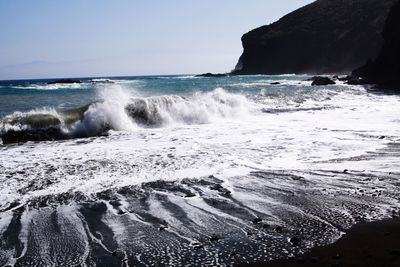 Scenic view of beach against sky