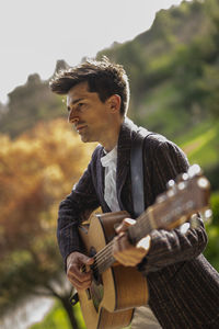 Young man playing guitar