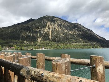 Scenic view of lake and mountains against sky