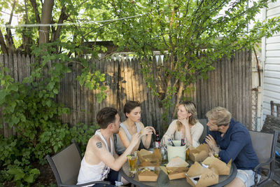 Friends eating at a party