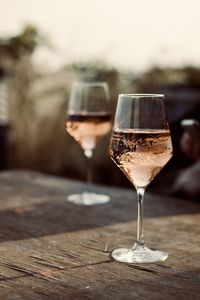 Close-up of wineglass on table