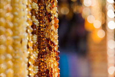 Close-up of illuminated hanging at market stall