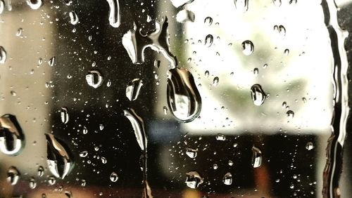 Full frame shot of wet glass